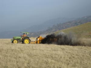A California rancher applies compost as part of a carbon-sequestration study. Credit Rebecca Ryals