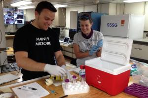 Stephanie Carr, at right, works with a student to process deep-sea samples aboard the R/V Atlantis. Credit: Beth Orcutt, Bigelow Laboratory. Stephanie Carr, at right, works with a student to process deep-sea samples aboard the R/V Atlantis. Credit: Beth Orcutt, Bigelow Laboratory.