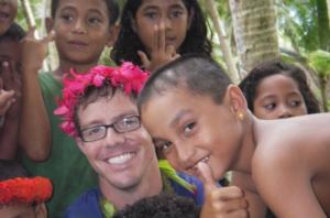 Hancock on Piig Island in Yap State surrounded by children he served as a family physician in 2007.