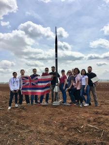 UH Project Imua team with their rocket.