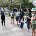 Christina Higgins and other faculty taking part in a tour of the UH Mānoa campus
