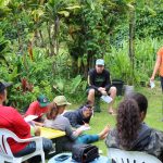 Kiana Frank teach an EA field school class outside at Kapuna Farms