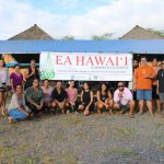 EA Hawaii Field School group posing in from of the EA Hawaiʻi Field School sign