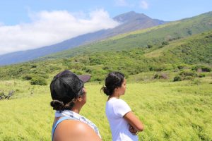 Two students looking up at Haleakalā