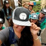 Kiana Frank and students repping their EA Hawaiʻi Field School hat