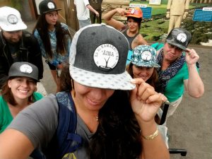 Kiana Frank and students repping their EA Hawaiʻi Field School hat