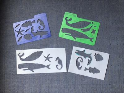 <p><strong>Fig. 4 (A) </strong>Stencils can be purchased (top) or cut from stiff paper or stencil plastic (bottom).</p>