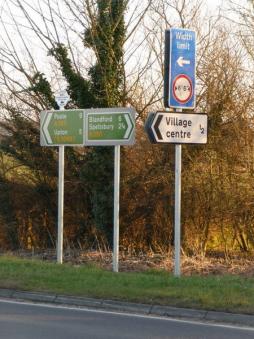 <p>Fig. 2. Road signs use patterns and colors to give information to drivers. These signs are located in&nbsp;Sturminster Marshall, England.</p>