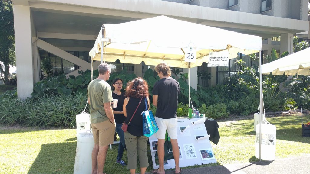 Prospective students and parents visit UROP's booth at Manoa Preview Day