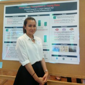 UROP student, Victoria Chang, standing by research poster.