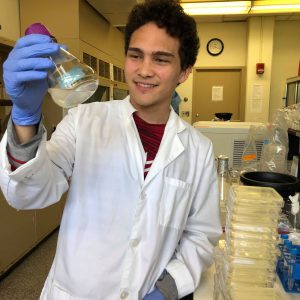UROP student, Kevin Vergara, conducting research in a lab.