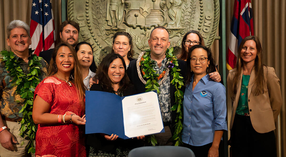 Gov. Josh Green with the UH One Health team at the proclamation signing.