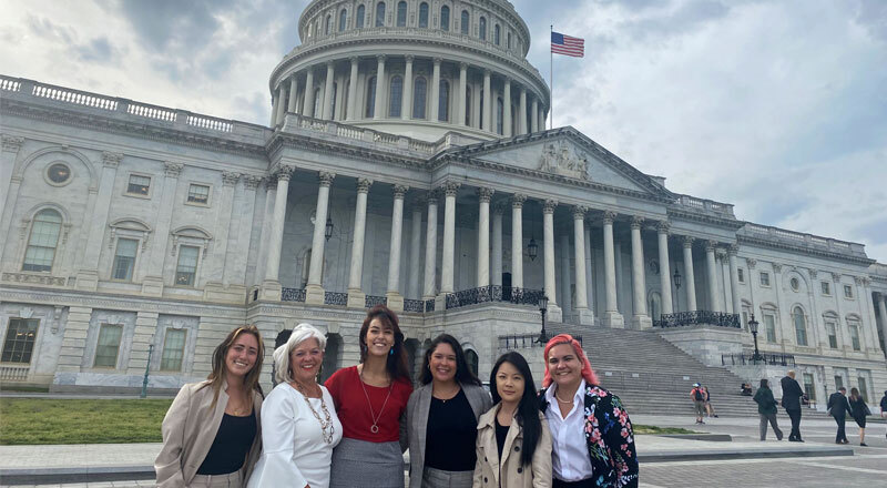 Students standing in front of the U.S. Capitol