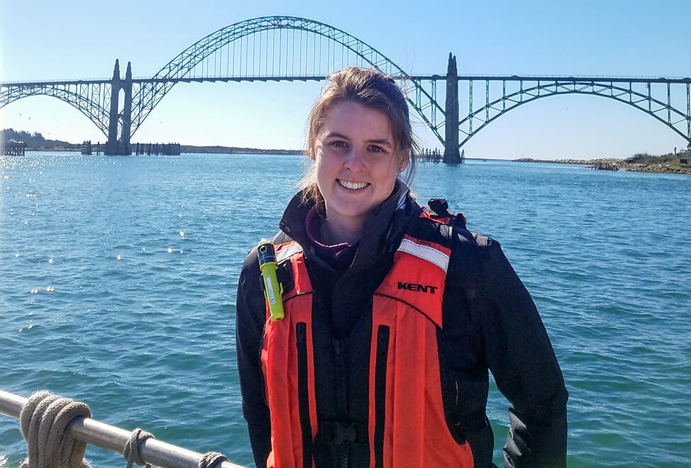 Hannah Lawrence with the Yaquina Bay Bridge Newport Oregon in the background