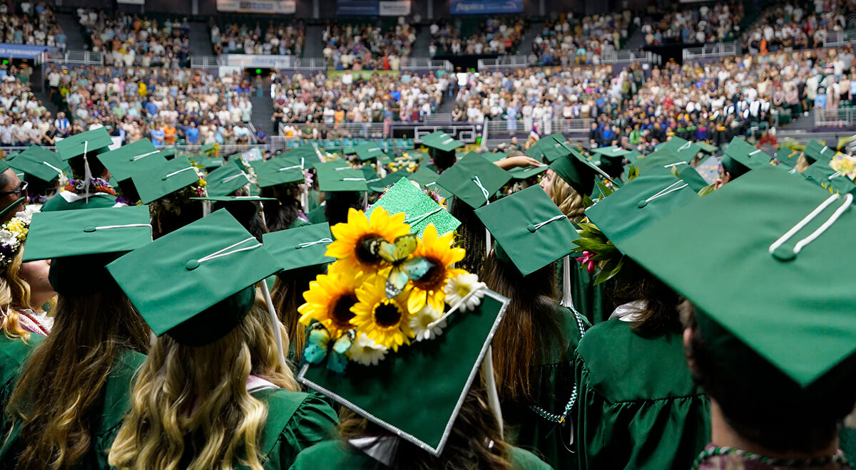 Graduating students attending their commencement ceremonies